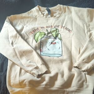 Cream Graphic Sweatshirt with Plant Illustration